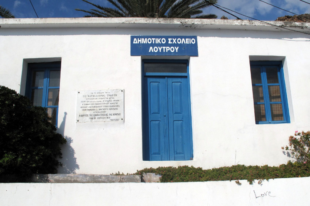 Located on the wall of the primary school building at the harbor of Loutro